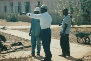 Clearing up the camp El Sy explaining what needs to be done with Chika Okeke watching on April 1996. Photo Clémentine Deliss Deliss