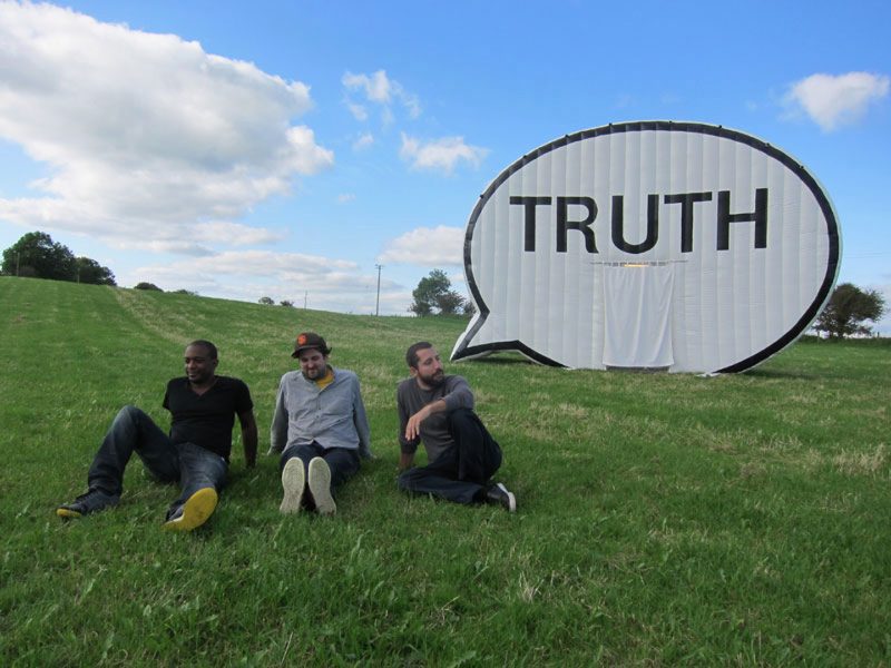 IN SEARCH OF THE TRUTH (THE TRUTH BOOTH)   BY HANK WILLIS THOMAS AND THE CAUSE COLLECTIVE