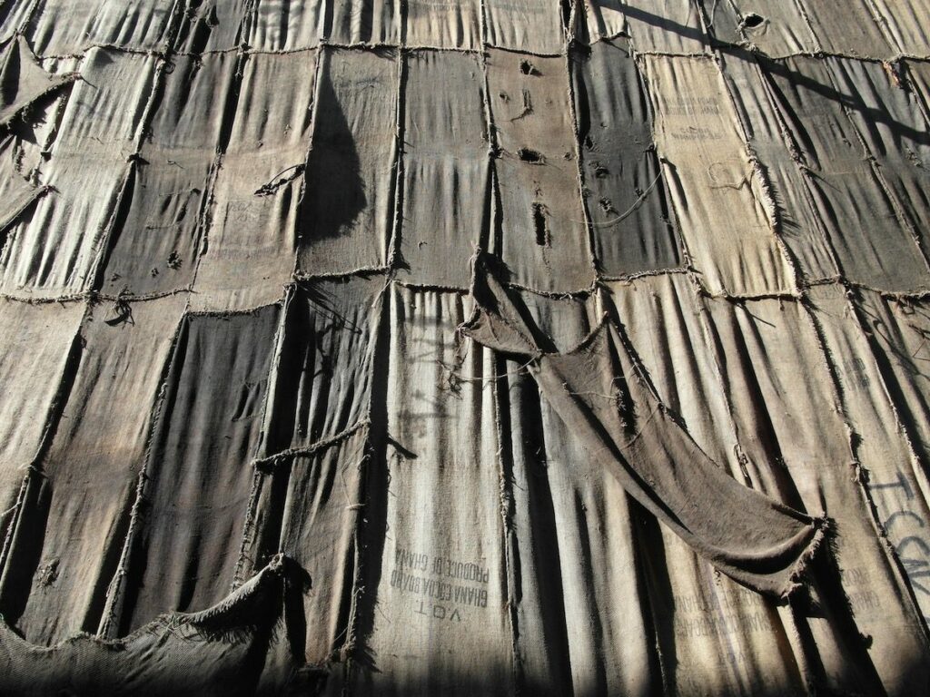 Ibrahim Mahama's Out of Bounds, an installation made of coal sacks in teh Arsenale SAM5619