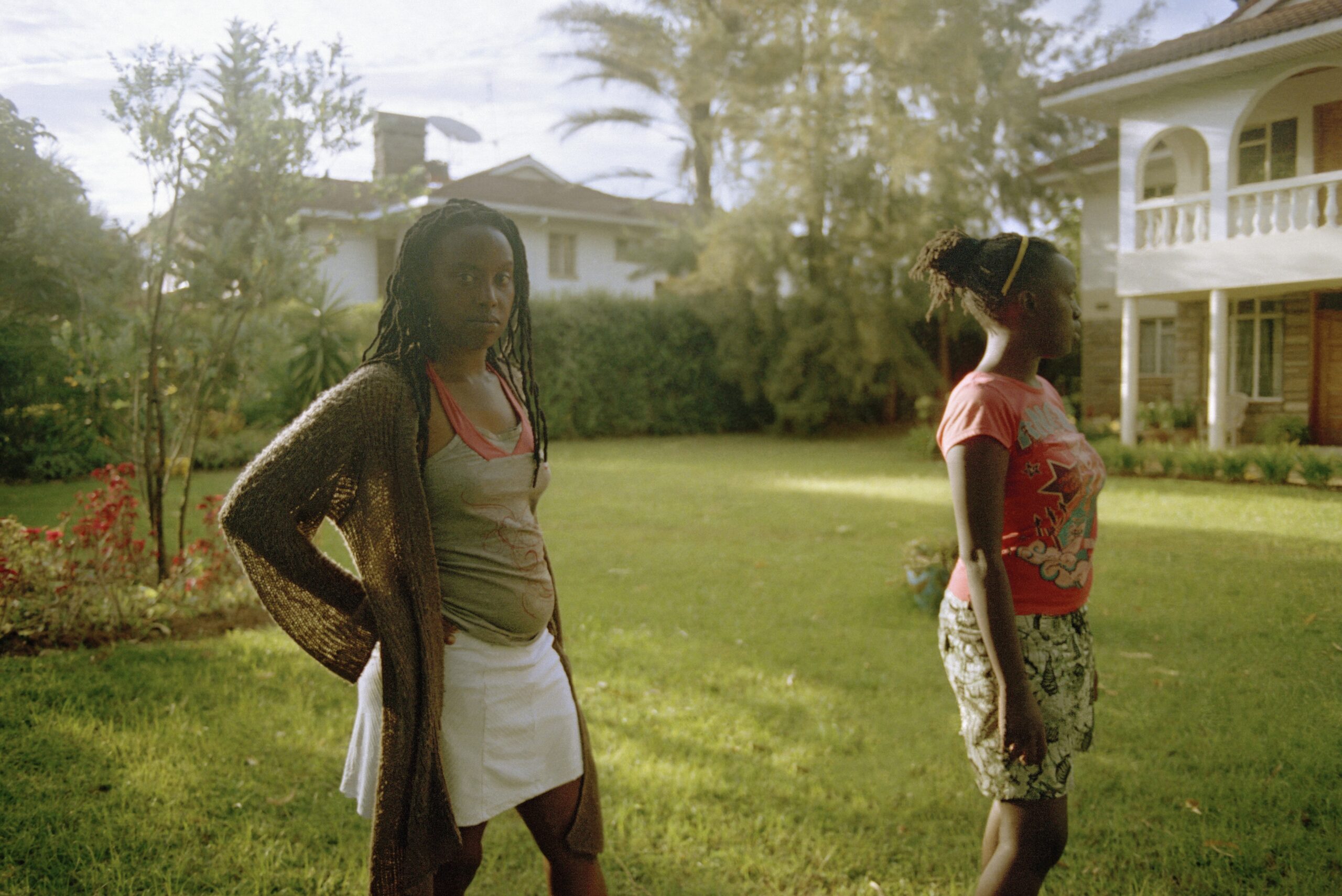 Mimi Cherono Ng’ok, Chebet and Chemu in the garden, from “The Other Country”, 2008-2016 Courtesy the artist and The Walther Collection