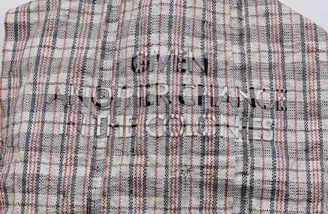 Dan Halter, Given Another Chance In The Colonies (detail), 2014. Found plastic weave bag with custom–woven tartan fabric. Courtesy of the artist and WHATIFTHEWORLD Gallery