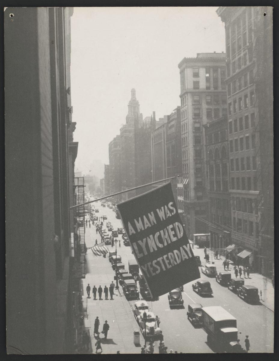 Flag, announcing lynching, flown from the window of the NAACP headquarters on 69 Fifth Ave., New York City, 1936. Photograph, 13 7/16 x 10 7/16 in. (34.1 x 26.5 cm). Prints and Photographs Division, Library of Congress, Washington, D.C, LC-DIG-ppmsca-39304. Courtesy of The Crisis Publishing Co., Inc., the publisher of the magazine of the National Association for the Advancement of Colored People, for material first published in The Crisis
