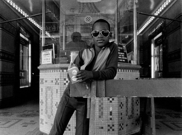 Dawoud Bey, A Boy in Front of the Loew's 125th Street Movie Theater (detail), 1976 (printed 1979). Gelatin silver print, 230 x 150 mm. © Dawoud Bey. Courtesy of Stephen Daiter Gallery.  