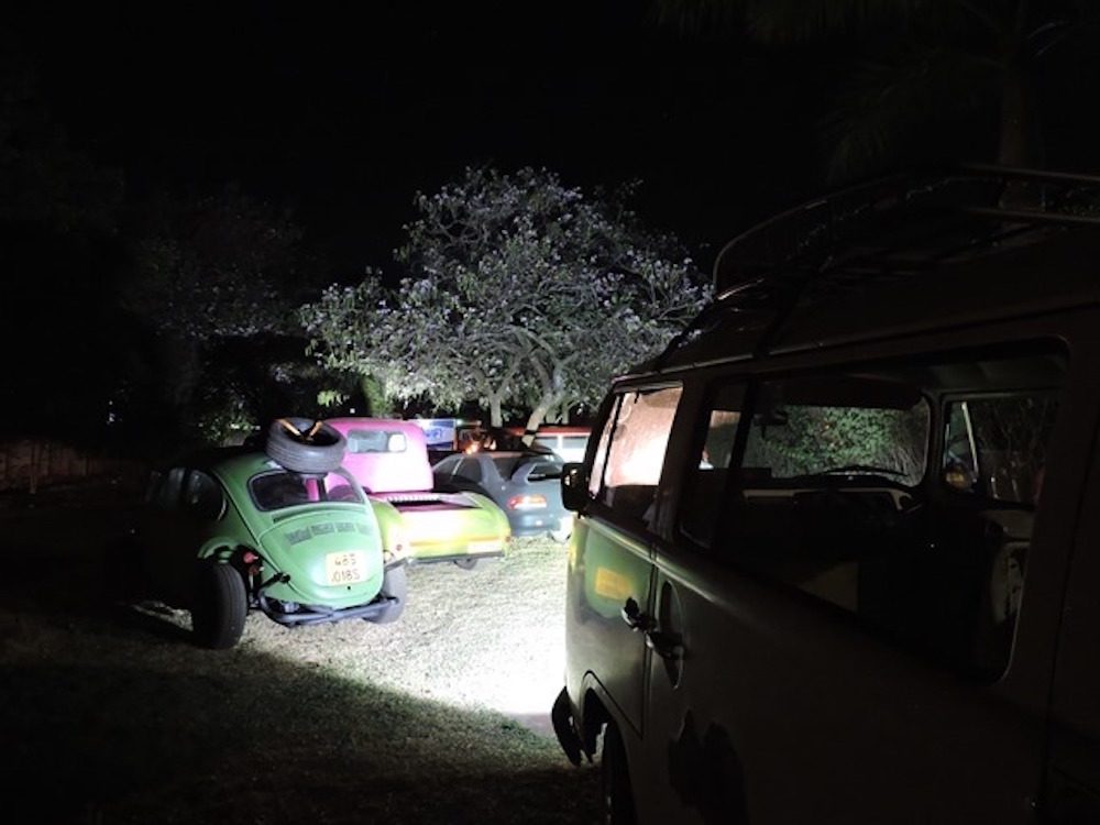 Array of old cars on display outside of the Village Unhu security wall. Photo: Tinashe Muchuri