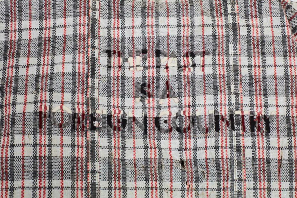 DAN HALTER
THE PAST IS A FOREIGN COUNTRY
2017
Found plastic weave bag with custom woven tartan fabric
88 x 100 cm
