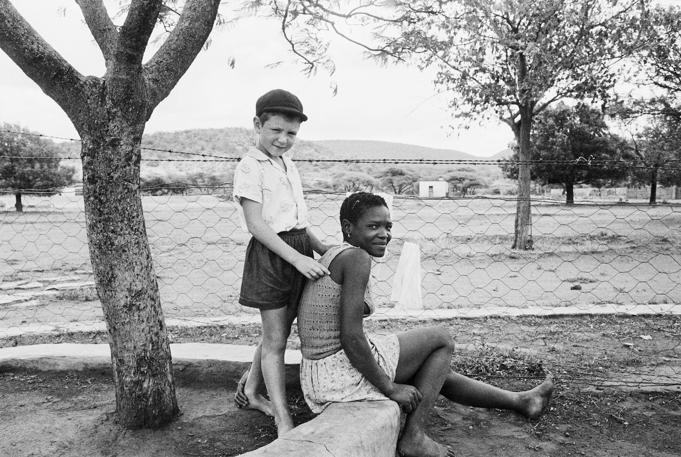 David Goldblatt, A farmer's son with his nursemaid, Heimweeberg, Nietverdiend, Western Transvaal, 1964. Courtesy Goodman Gallery
