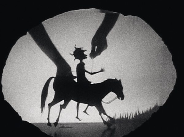 KARA WALKER, “Testimony: Narrative of a Negress Burdened by Good Intentions,” 2004 (DVD video, boxed with cut paper silhouettes, beta master; 8 minutes, 49 seconds). | © Kara Walker, via Spruth Magers