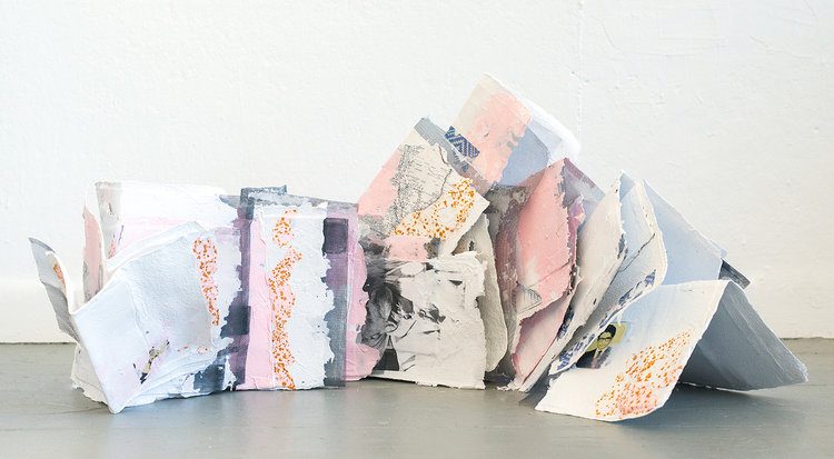 Tahir Carl Karmali. PAPER:landscape, 2017. Handmade paper pulped from photocopied government-issued identification documents and commercial paper; with aluminum mesh, photocopy collage, rust transfer, and other mixed media collage. Installation dimensions variable. Courtesy the artist. © 2019 the artist.
