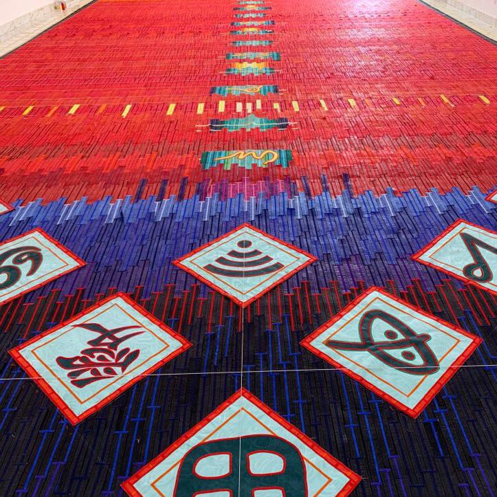 Abdoulaye Konate, Detail of Idéogrammes, signes, symboles et logos (Hommage à Youssouf Tata Cissé et Germaine Dieterlen) , 2020. Fabric, 12 x 15 m. Courtesy of the artist and BlainISouthern, London. 