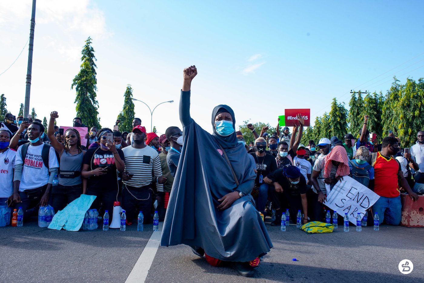 Victor Odiba, Aisha Yesufu addressing an #EndSARS protest in Abuja, 2020. Courtesy the artist.