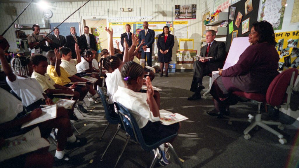 President George W. Bush participates in a reading demonstration the morning of Tuesday, Sept. 11, 2001, at Emma E. Booker Elementary School in Sarasota, Fla.  Photo by Eric Draper, Courtesy of the George W. Bush Presidential Library