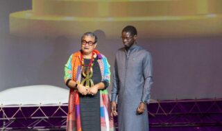 Artist Agnès Brezephin from the Martinique island is presented the Léopold Sédar Senghor by Senegalese president Bassirou Diomaye Faye Présidence Sénégal